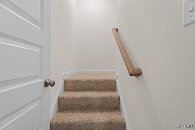 11777 Pine Needles Dr, New Kent, VA 23140 - staircase featuring carpet floors and baseboards