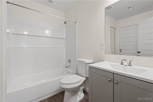 11777 Pine Needles Dr, New Kent, VA 23140 - bathroom featuring wood finished floors, toilet,  shower combination, and vanity