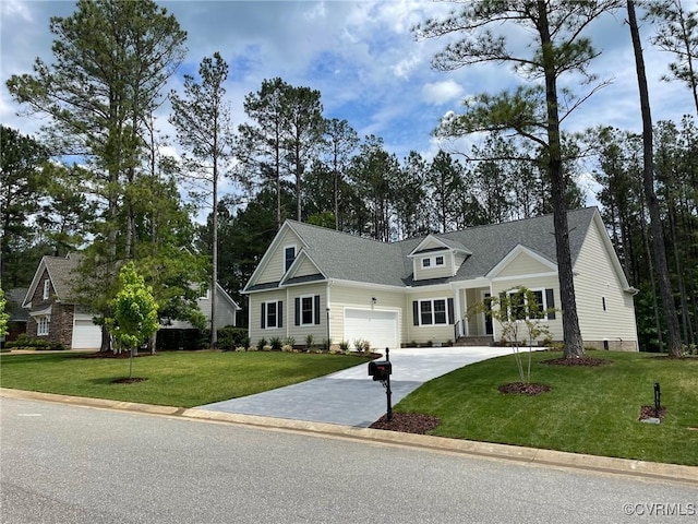 11777 Pine Needles Dr, New Kent, VA 23140 - view of front of home featuring a front lawn, driveway, an attached garage, and roof with shingles