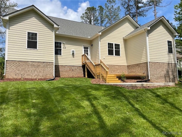 11777 Pine Needles Dr, New Kent, VA 23140 - rear view of property with brick siding and a lawn