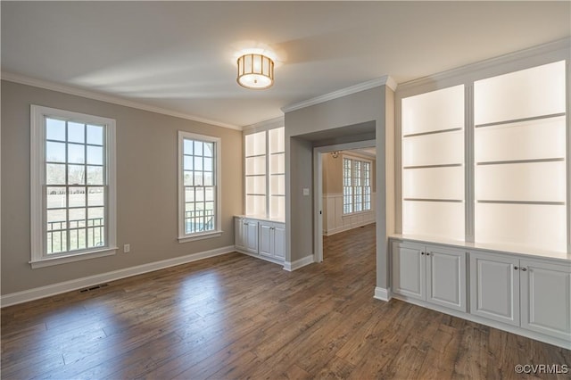 8383 Mount Eagle Rd, Hanover, VA 23005 - spare room featuring crown molding, baseboards, dark wood-style floors, and healthy amount of natural light