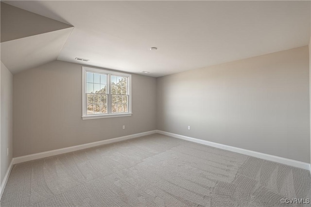 8383 Mount Eagle Rd, Hanover, VA 23005 - empty room with light carpet, baseboards, and vaulted ceiling
