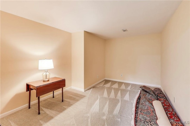 spare room with carpet floors and baseboards