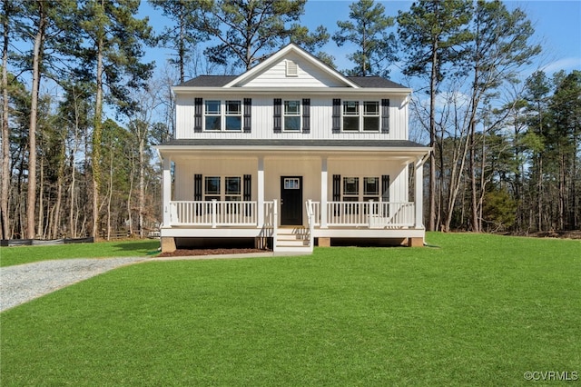 view of front of property featuring board and batten siding, covered porch, roof with shingles, and a front lawn