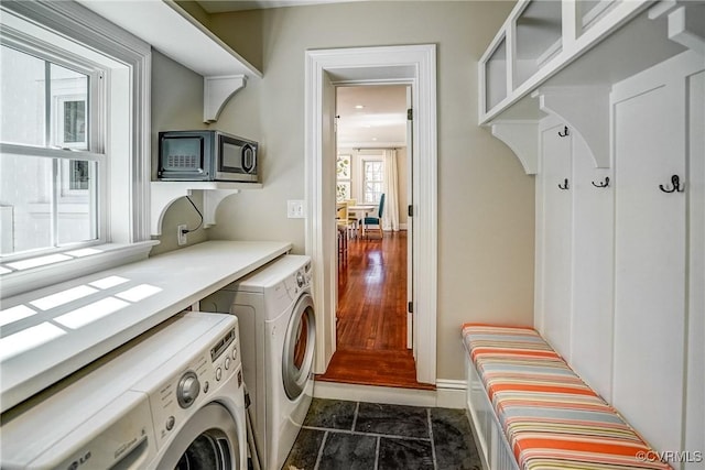 laundry area with laundry area and washing machine and clothes dryer