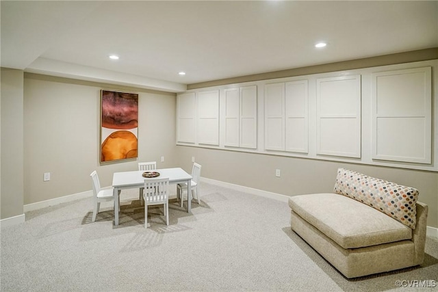 dining space featuring recessed lighting, baseboards, and light colored carpet