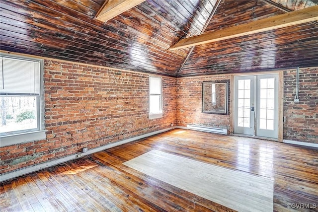 empty room with brick wall, a baseboard heating unit, wood ceiling, french doors, and wood-type flooring