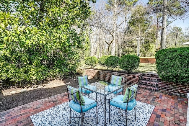 view of patio with outdoor dining space