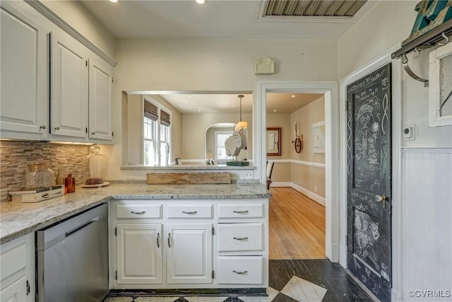 kitchen featuring dark wood-style floors, visible vents, backsplash, stainless steel dishwasher, and white cabinets