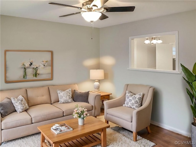 605 Conley Rd, Richmond, VA 23227 - living area featuring a ceiling fan, baseboards, and wood finished floors