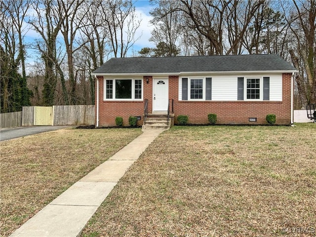 605 Conley Rd, Richmond, VA 23227 - view of front of property with crawl space, fence, a front lawn, and brick siding