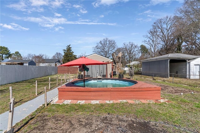 view of pool featuring a fenced backyard
