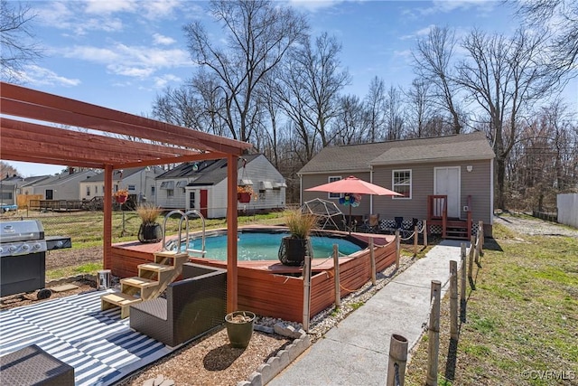 view of pool featuring a fenced in pool, fence, area for grilling, and a pergola