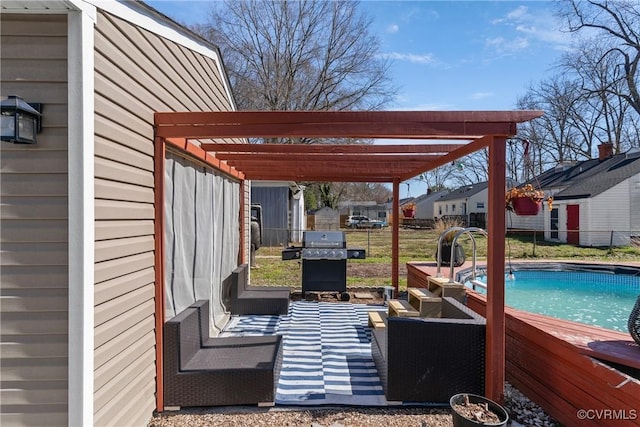 view of patio / terrace with area for grilling, an outdoor pool, fence, and a pergola