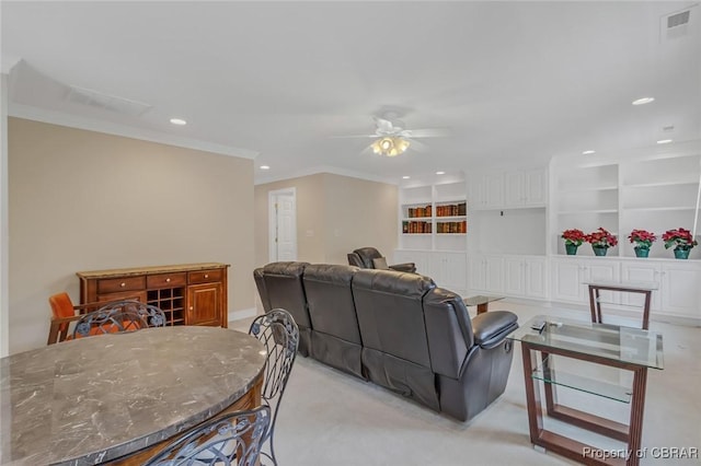 living room with crown molding, recessed lighting, visible vents, light carpet, and ceiling fan