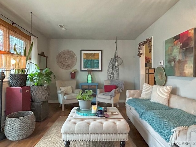 living area featuring wood finished floors