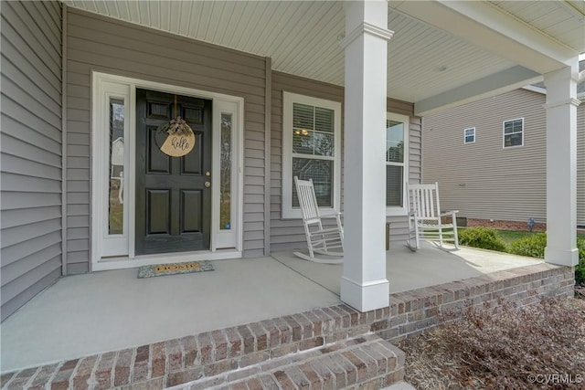 doorway to property with a porch