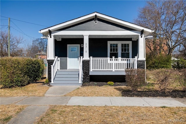 view of front of property featuring covered porch