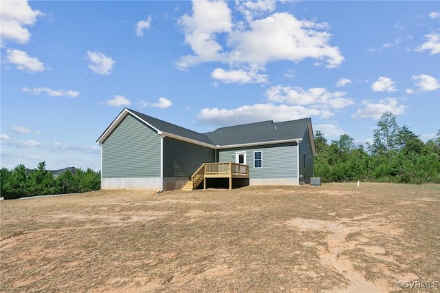 rear view of property with a deck