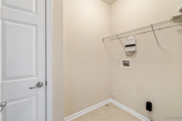 washroom featuring washer hookup, laundry area, hookup for a gas dryer, and baseboards