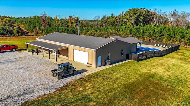 exterior space featuring a forest view