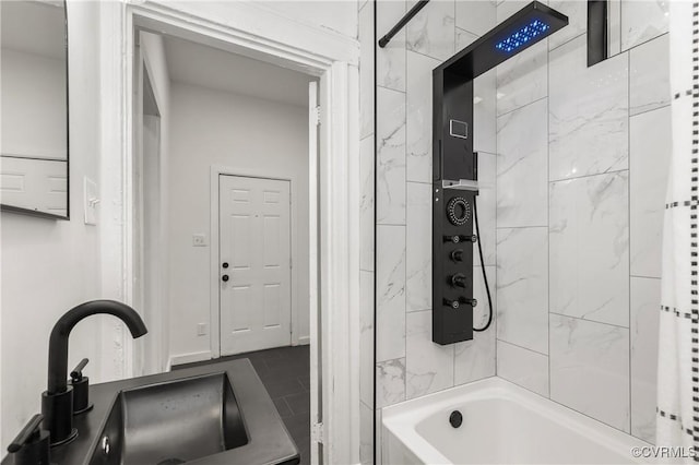 full bathroom featuring a sink and shower / bathing tub combination