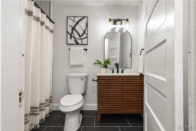 bathroom featuring vanity, tile patterned floors, toilet, baseboards, and a shower with shower curtain
