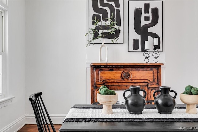 room details featuring wood finished floors and baseboards