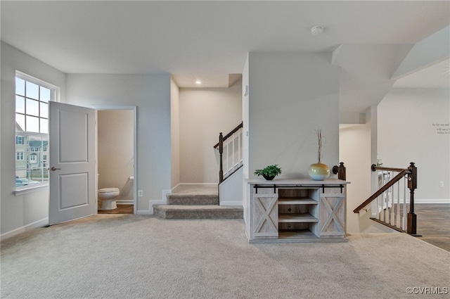 interior space featuring recessed lighting, carpet flooring, and baseboards