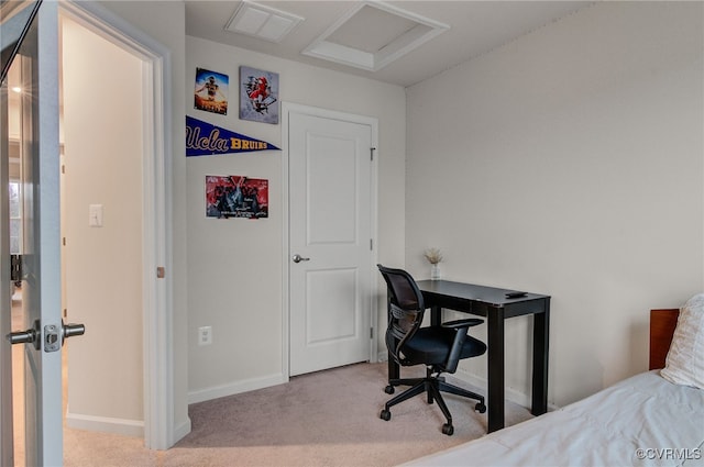 carpeted bedroom with attic access, visible vents, and baseboards