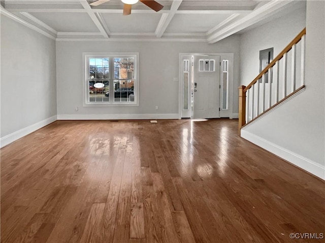 foyer with coffered ceiling, stairway, baseboards, and hardwood / wood-style flooring