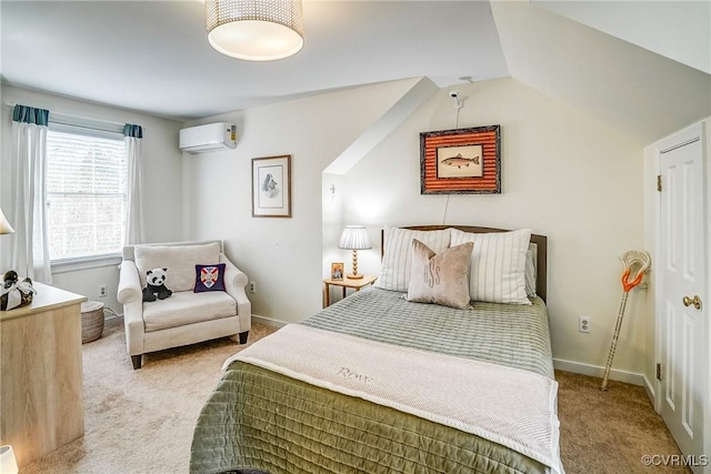 bedroom with baseboards, carpet floors, and a wall mounted AC