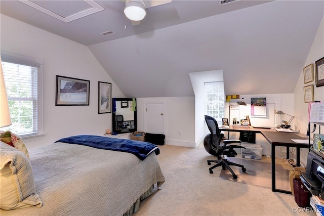 bedroom featuring carpet floors, lofted ceiling, visible vents, a ceiling fan, and baseboards