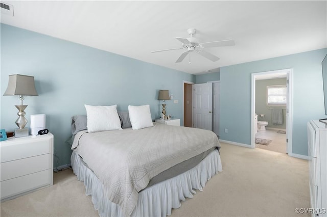 bedroom featuring visible vents, baseboards, a ceiling fan, connected bathroom, and light colored carpet