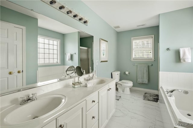 bathroom with marble finish floor, visible vents, a sink, and toilet