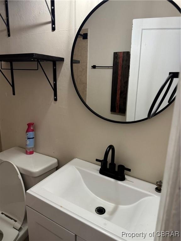 1029 7th St, Petersburg, VA 23803 - bathroom featuring toilet and vanity