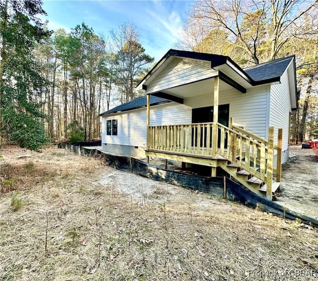 view of front of home featuring crawl space
