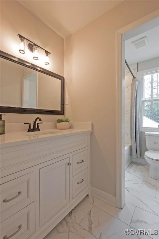 full bathroom featuring marble finish floor, vanity, toilet, and baseboards