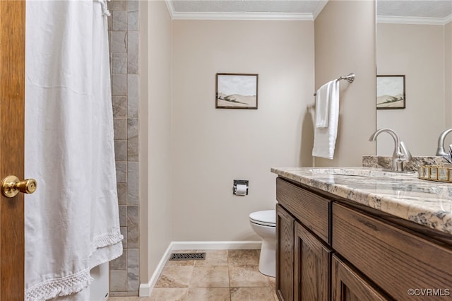 full bath featuring ornamental molding, a tile shower, vanity, and baseboards