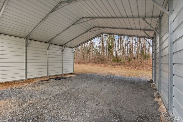 view of parking with a detached carport