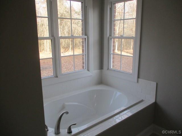 bathroom with a bath