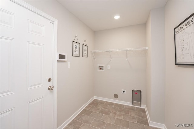 clothes washing area with washer hookup, laundry area, hookup for an electric dryer, and baseboards