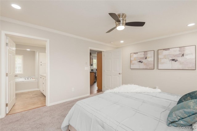 bedroom with baseboards, light colored carpet, ensuite bath, crown molding, and recessed lighting