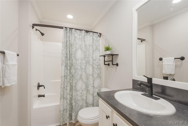 full bath featuring ornamental molding, vanity, toilet, and shower / tub combo