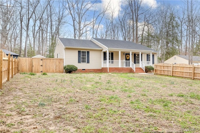 ranch-style house featuring a fenced backyard, crawl space, covered porch, a gate, and a front lawn