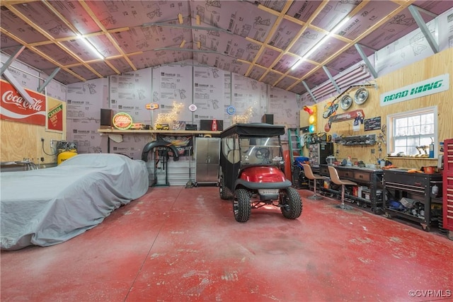 garage with a workshop area