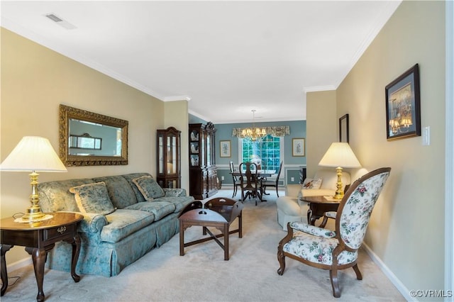 carpeted living area featuring visible vents, baseboards, an inviting chandelier, and ornamental molding