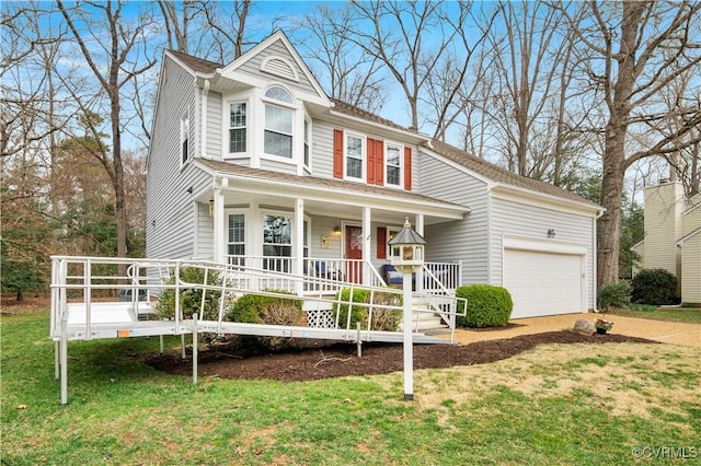 view of front of house with a porch, a front lawn, and a garage