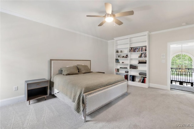 bedroom featuring carpet floors, crown molding, baseboards, and a ceiling fan