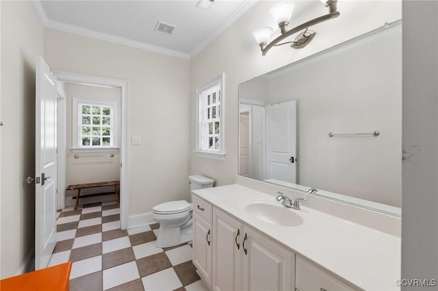 bathroom with visible vents, crown molding, toilet, and tile patterned floors